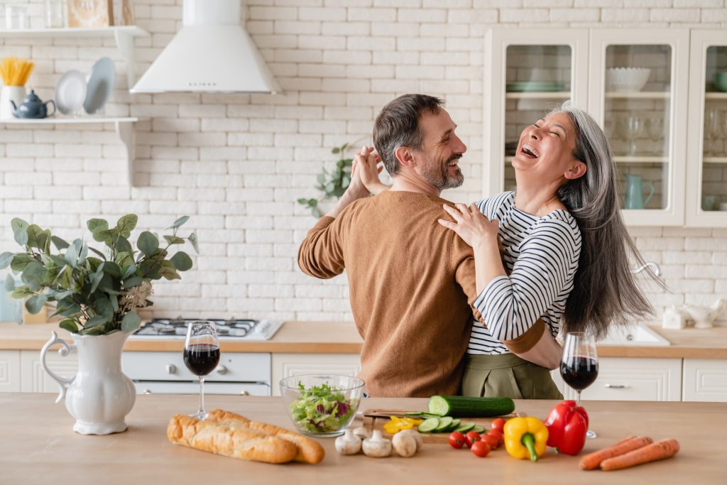 Couple dancing in the kitchen