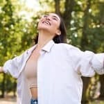 smiling-asian-woman-in-park