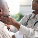 doctor-thyroid-exam