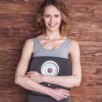 Why Hormone-Based Weight Loss is a Game-Changer for Orlando Residents woman-scale