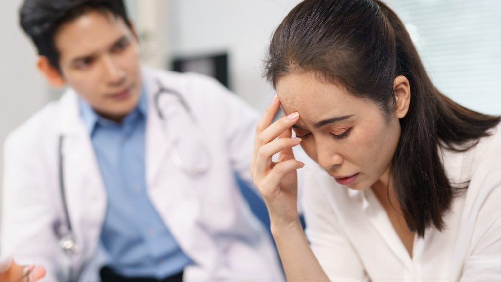 Patient discussing concerns with doctor.