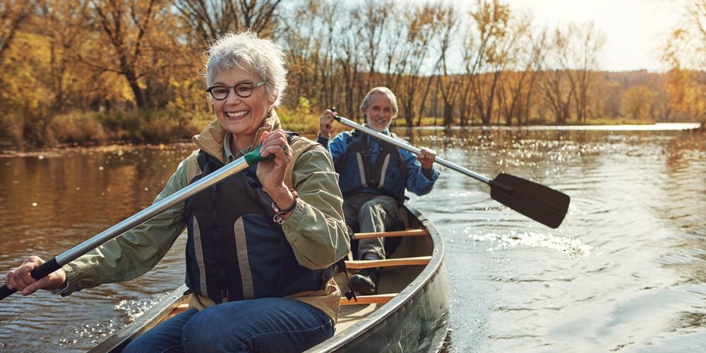 Woman rowing kayak