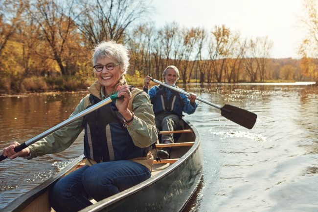 Woman rowing kayak