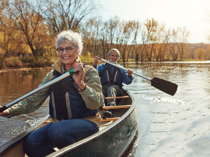 Woman rowing kayak