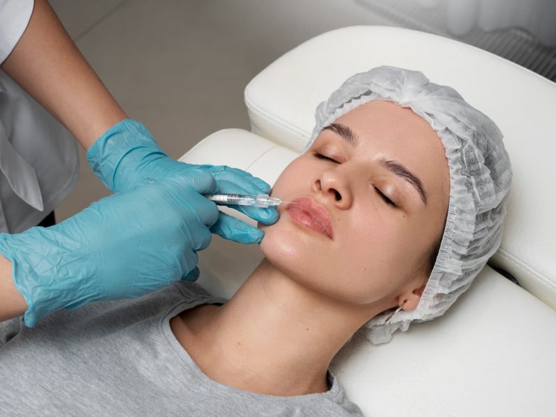 high-angle-woman-getting-lips-injection high-angle-woman-getting-lips-injection